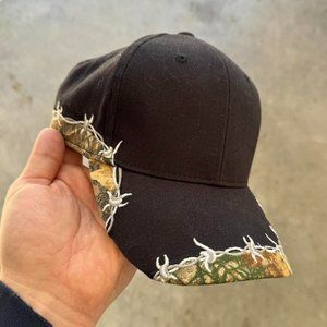 Vintage 90s Style Real Tree Camo Embroidered Black Barbed Wire Trucker Hat